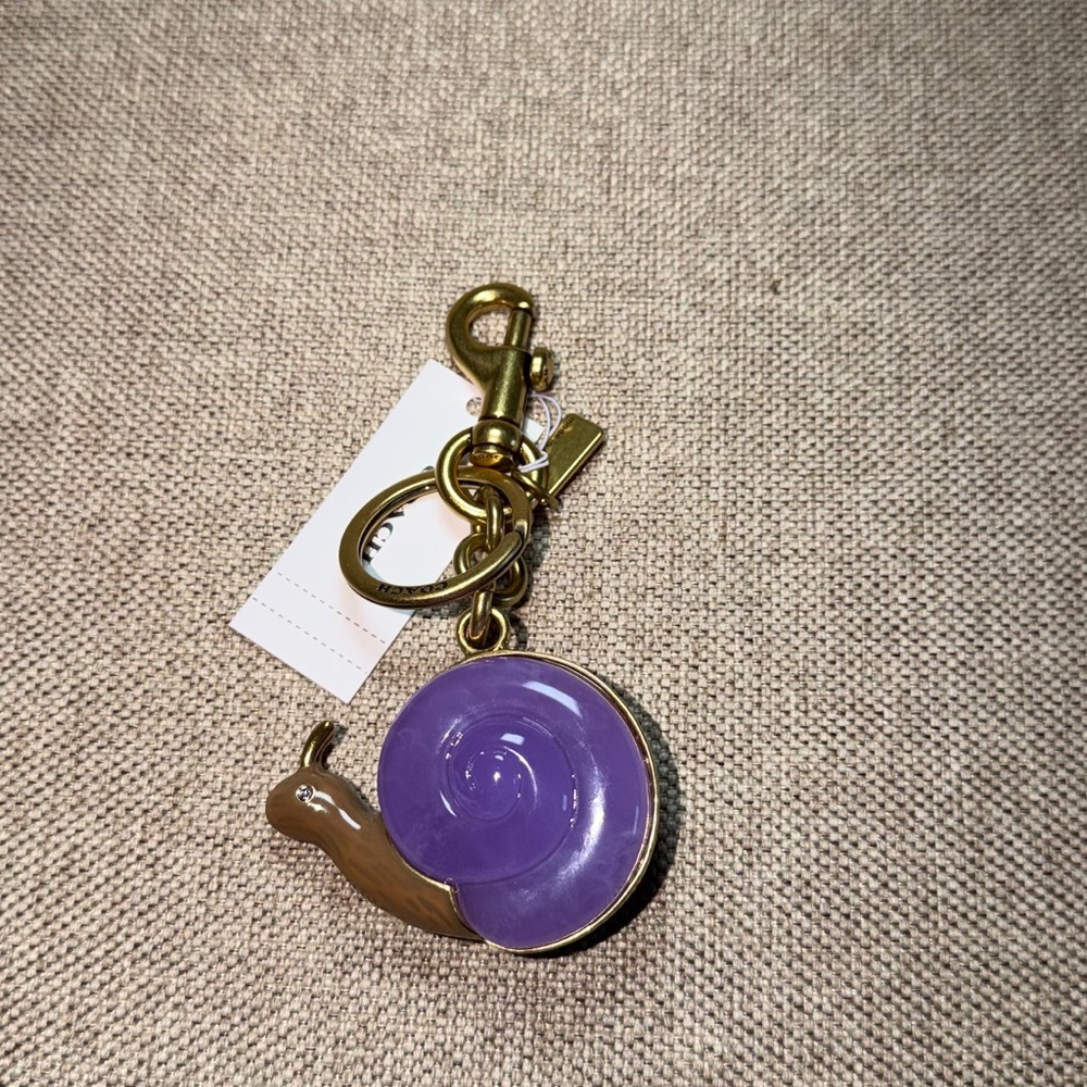 Coach Gold and Purple Snail Keychain - Picture 3 of 3